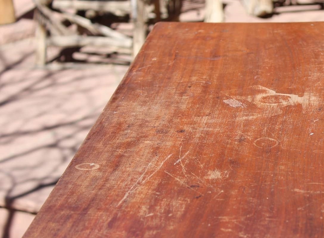 furniture before  restoration with water marks and scratches